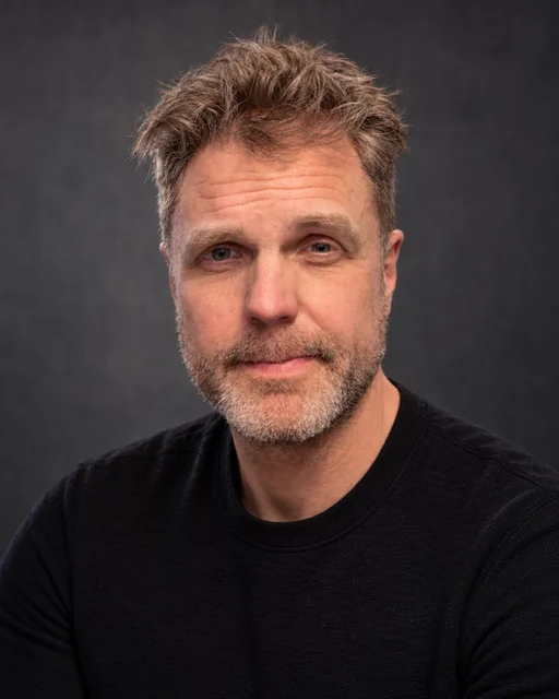 Portrait of Jason Denton.